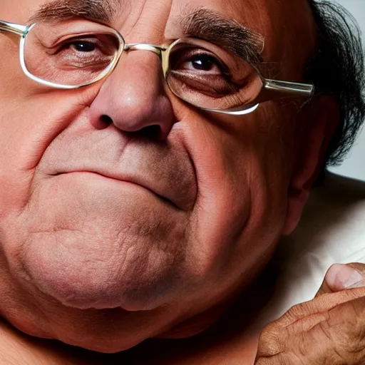 Image similar to Danny DeVito laying on a bed playing with his didgeridoo, cinematic, studio light, 8K,