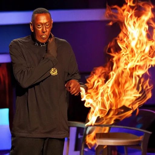 Image similar to arsonist arsenio hall lighting a hall on fire