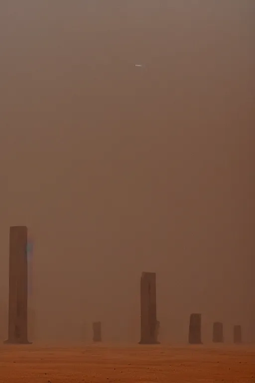 Image similar to a tall room, monolithic, open wall architecture, sand storm enters, streaks of dust, high winds, concrete pillars, ancient sci - fi elements, on an alien planet, sun is blocked by dust, pale orange colors, cinematographic wide angle shot, directed by christopher nolan