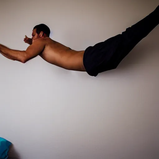 Image similar to a man doing a belly flop on the bed
