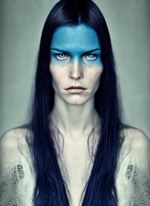 Prompt: portrait photograph of the most beautiful woman with a long dark blue hair, blue eyes, stern expression, lorenzo agius, alessio albi