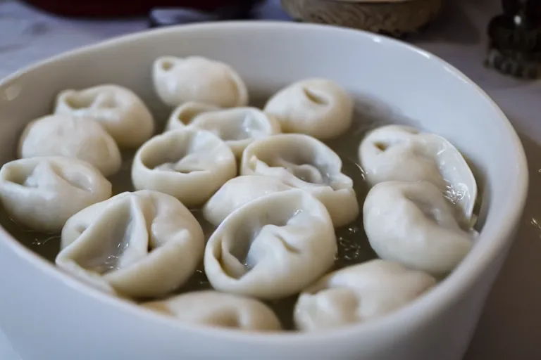 Prompt: a bathtub full of pelmeni