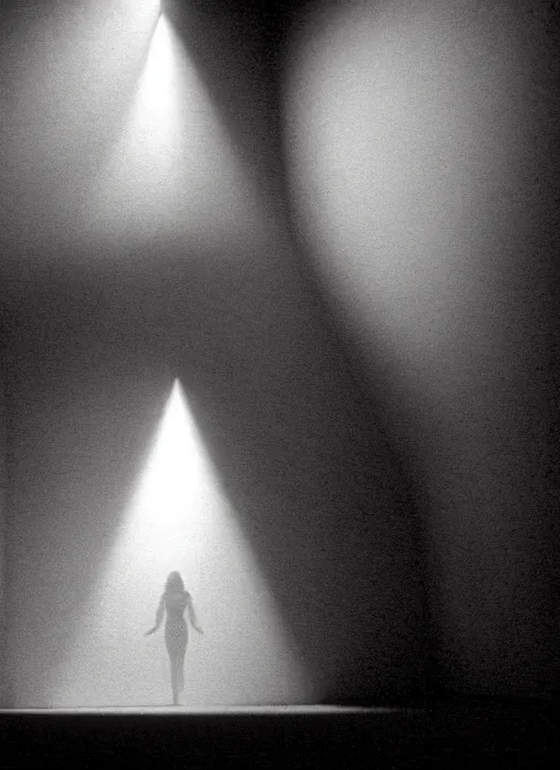 Image similar to a bright silhouette hovers above the ground inside of a hall. liminal, cozy, set design by alessandra querzola ( 1 9 8 8 )
