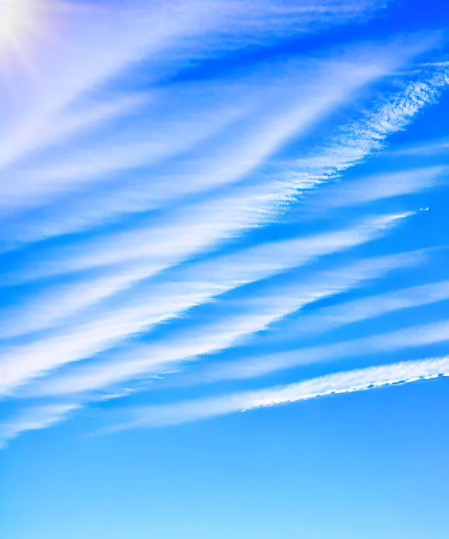 Prompt: thin cloud trails in cursive on clear blue sky