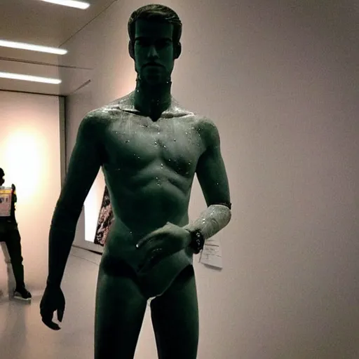 Image similar to “ a realistic detailed photo of a guy who is an attractive humanoid who is half robot and half humanoid, who is a male android, actor liam hemsworth, shiny skin, posing like a statue, blank stare, at the museum, on display ”