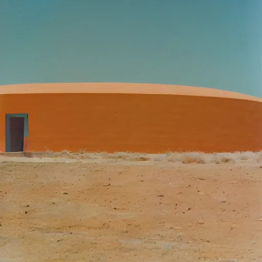 Prompt: a man in brightly colored clothing standing outside a Non-Euclidean orb-like clay house sitting in the desert, vintage photo, beautiful cinematography, blue sky, film grain, James Turrell