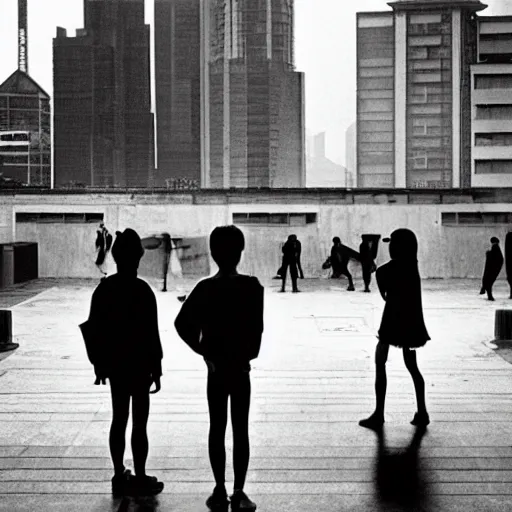 Image similar to a small rooftop with a couple of modern subculture teenagers standing and talking to each other, wearing black modern clothes, modern shanghai bund is on the background, sunset, by gregory crewdson