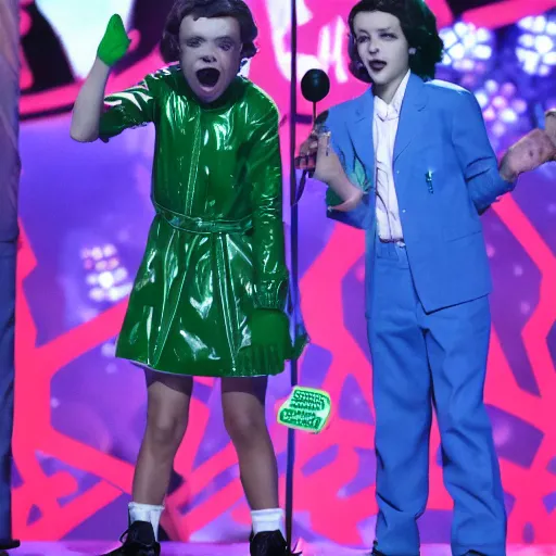 Image similar to stranger things demogorgon getting slimed at the kids choice awards