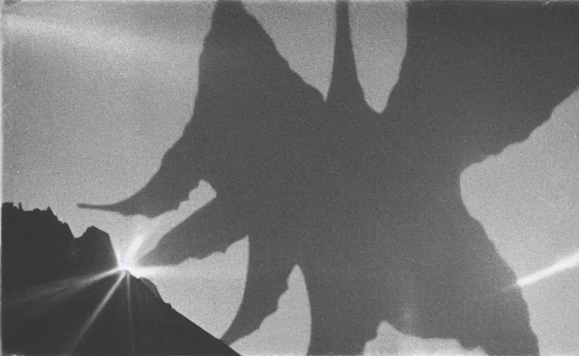 Prompt: analog polaroid of a kaiju-eiga, giant monster with starfish arms, seen from afar, sun and shadow over a city, lens flare, film grain, azure tones, monochrome and red color bleed