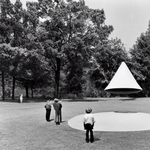 Prompt: an Adamski-style flying saucer landing in a park, 1950s photo