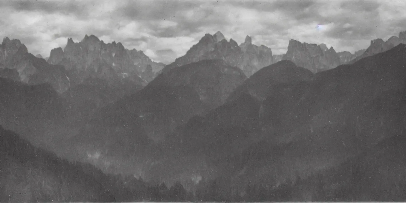 Prompt: dark tyrolean valley with cloudy dolomites in background photographed from the valley, 3 5 mm, dark, eerie, 1 9 2 0 s ghost photography