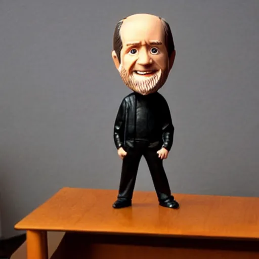 Prompt: george carlin bobble head figurine on a nice expensive desk