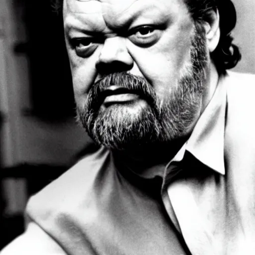 Image similar to muscular orson welles in 1 9 8 3