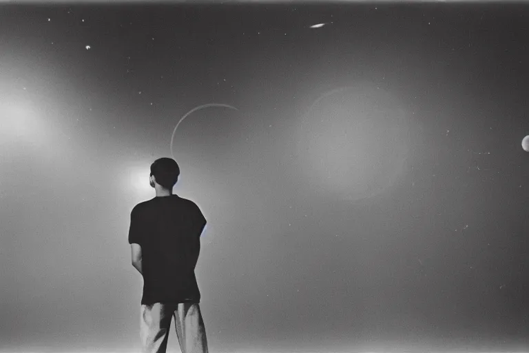 Prompt: a young man stands in the planetarium, planets and stars at background, low low exposure, decisive moment, anri cartier bresson