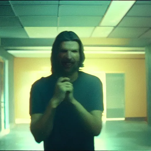 Image similar to a vhs still portrait of aphex twin breaking into the office from a gritty cyberpunk 2 0 0 0 s james cameron movie about spider - man. realism, cinematic lighting, 4 k. 8 mm. grainy. panavision.