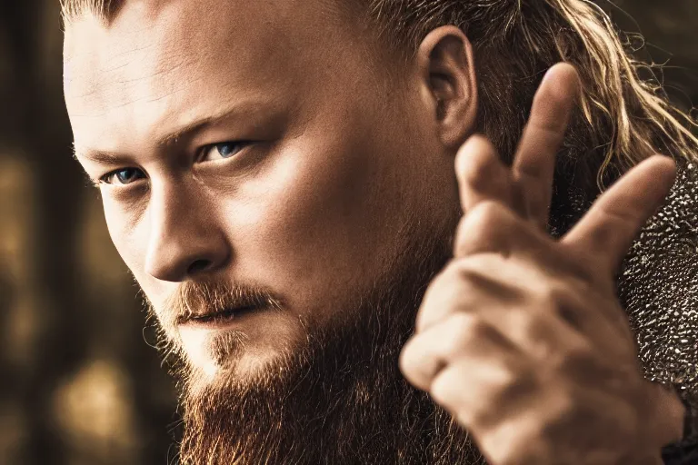 Prompt: a portrait photograph of Ragnar Lothbrok, high resolution image taken with a DSLR camera