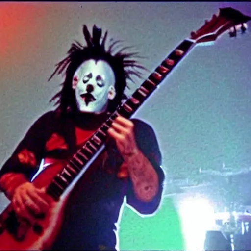 Prompt: Psychotic clown playing 7-string-guitar, concert, concert lighting, Slipknot, 2002, MTV, VHS quality