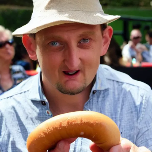 Image similar to Tim Robinson biting his hand instead of the hot dog in his hand