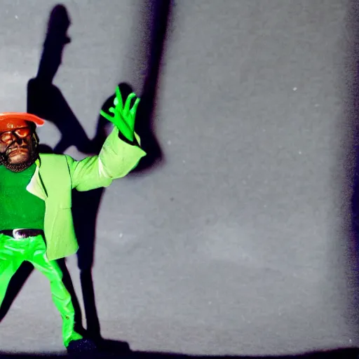 Image similar to a claymation film still of mf doom rapping. claymation by bruce bickford