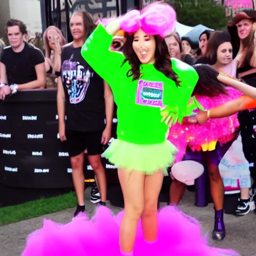 Image similar to Tiffany Day getting Nickelodeon slimed at Nickfest in a pink tutu and black boots