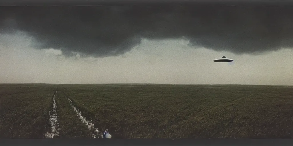 Image similar to detailed medium format photo, polaroid still from tarkovsky movie, saucer shaped ufo flying over a rural landscape haze, high production value, intricate details, 8 k resolution, hyperrealistic, hdr, photorealistic, high definition, tehnicolor, award - winning photography, masterpiece, amazing colors