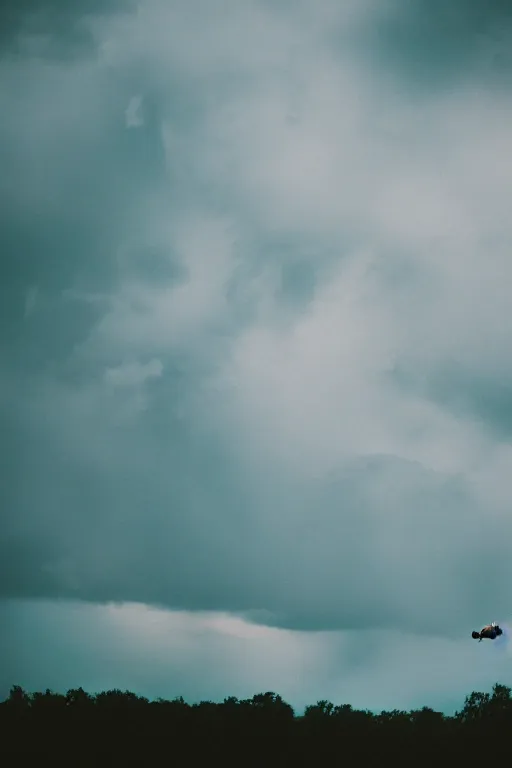 Image similar to agfa vista 4 0 0 photograph of a guy flying through the clouds, moody lighting, moody vibe, telephoto, 9 0 s vibe, grain, vintage, tranquil, calm, faded