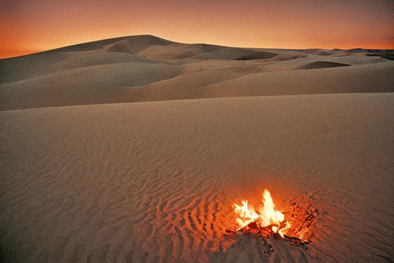 Image similar to blue hour, sand dunes beneath fire, 35mm, film photo, steve mccurry