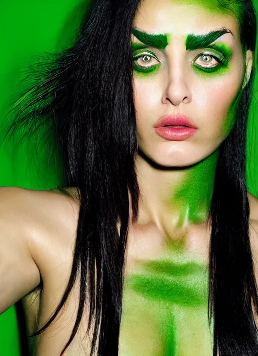 Image similar to a photo portrait of a very muscular woman with dark green hair and green skin by terry richardson, sharp focus.