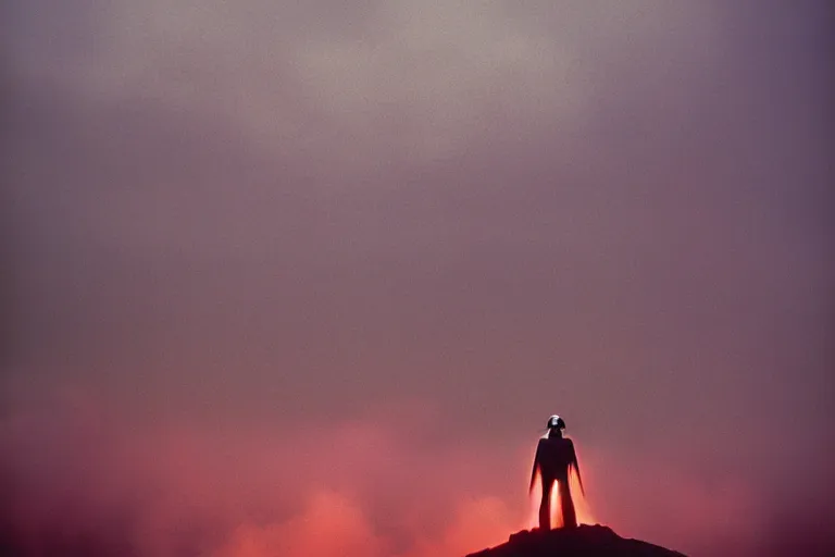 Image similar to darth vader on top of a tall mountain, blue fog, tornadoes surrounding, film photography, soft lighting, vignette