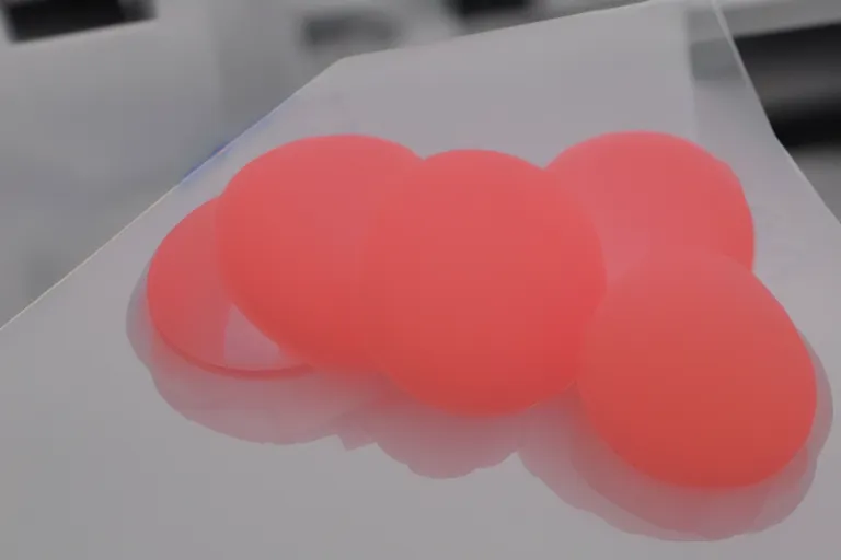 Prompt: translucent silicone rubber toy on display