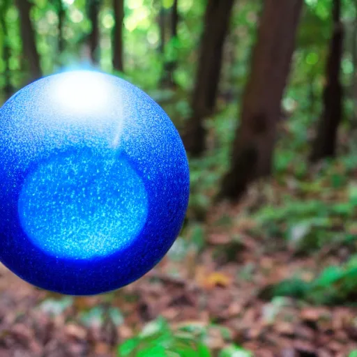 Prompt: what is this glowing blue orb i found in the woods at the park?