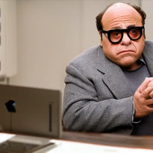 Image similar to danny devito bleary eyed at a computer, film still from the movie directed by Denis Villeneuve