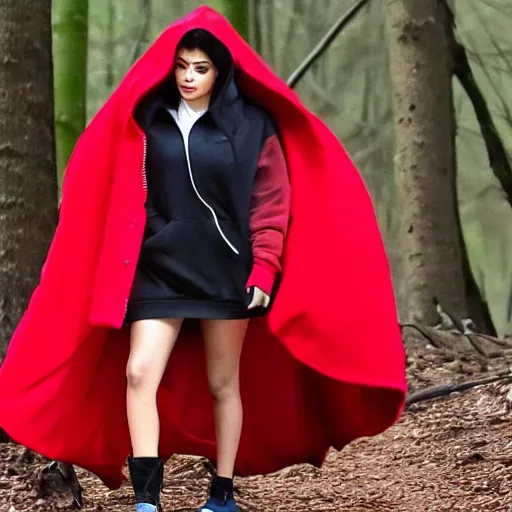 Prompt: Kylie Jenner wearing a red hooded Cape with the hood up over her head, walking through a scary forest, photo