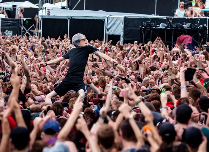 Image similar to photo still of richard belzer on stage at vans warped tour!!!!!!!! at age 3 3 years old 3 3 years of age!!!!!!!! stage diving into the crowd, 8 k, 8 5 mm f 1. 8, studio lighting, rim light, right side key light