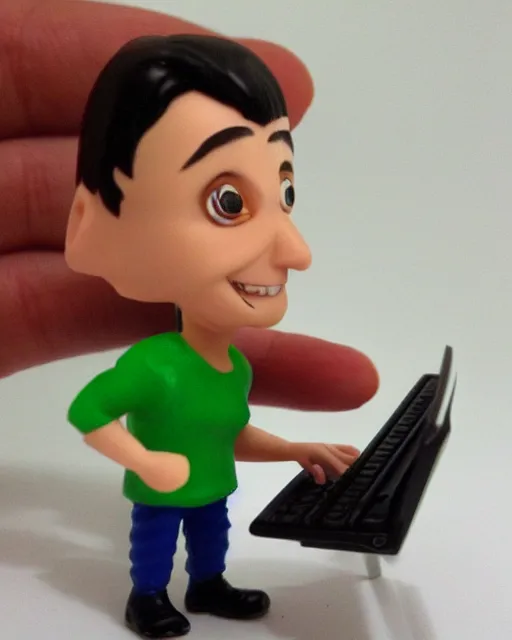 Prompt: a cute little plastic chibi statuette of jerma 9 8 5 on computer, ebay listing, product picture, advertisement, thumbnail