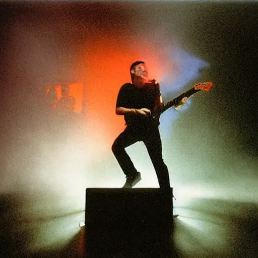 Prompt: Trent Reznor screaming and smashing a guitar on a synthesizer, smoke, colored projections, ultrafine detail, high contrast, projections, associated press photo, masterpiece