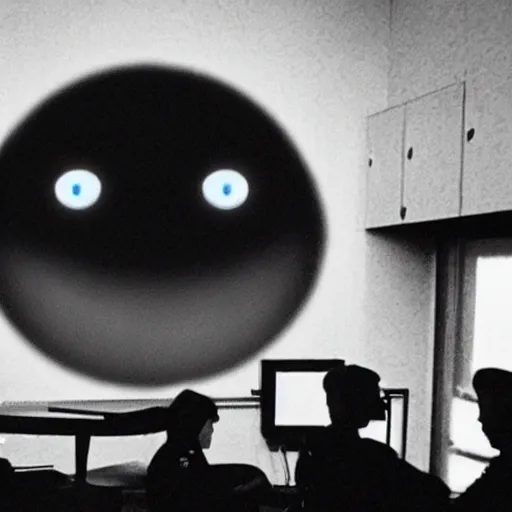 Image similar to surveillance footage of a giant eyeball being interrogated by police in an interrogation room