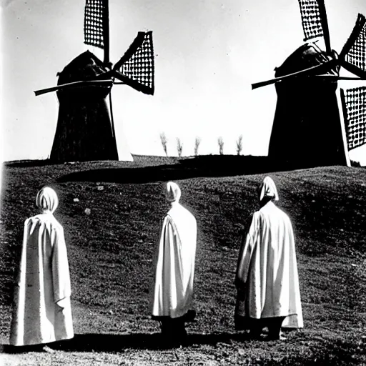 Image similar to worshippers dressed in robes belonging to the cult of the windmill. Dilapidated 1800s windmill. Old windmill. 1800s photo.