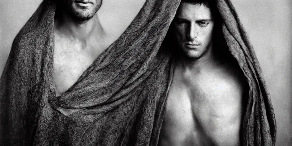 Image similar to a man with a slight stubble is lookin through the shawl, photo by Annie Leibovitz,