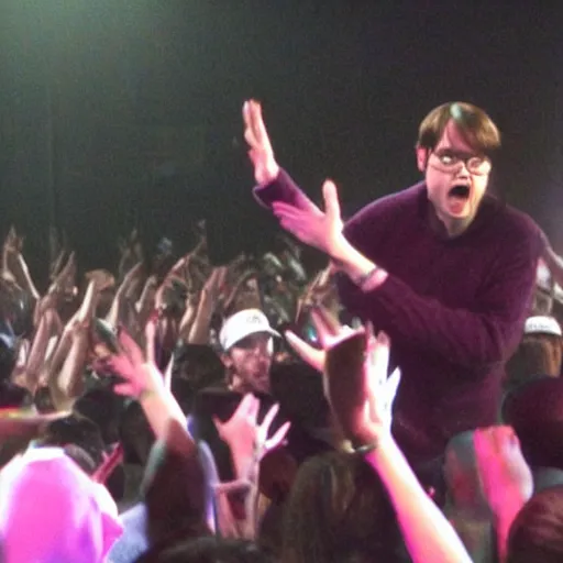 Prompt: Dwight schrute on stage at a hip hop concert throwing beets at the crowd