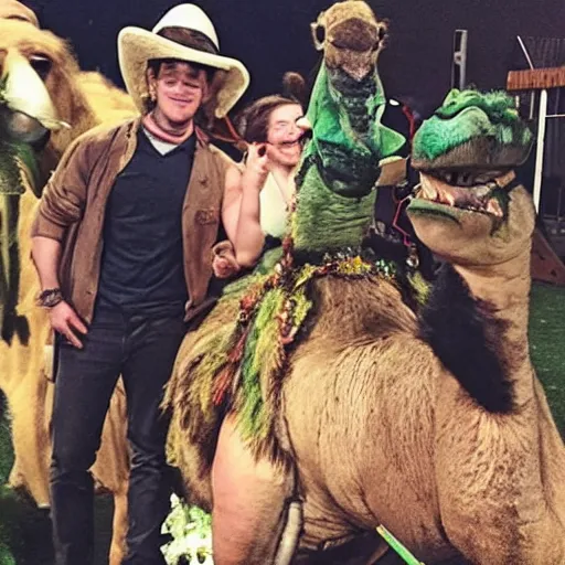 Image similar to photo of Emma Watson as an actual camel at a Halloween party. The Hulk is riding the camel and has flowers in his hair.