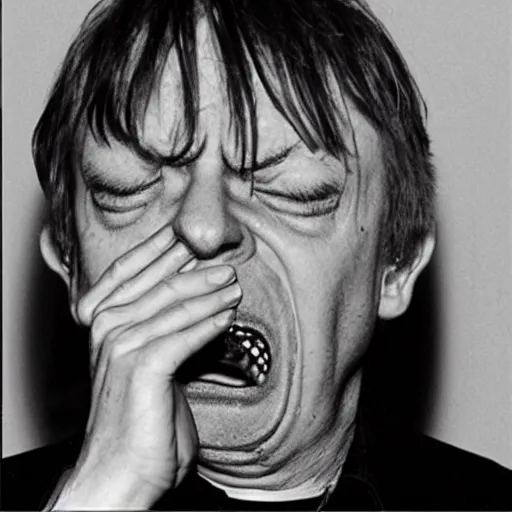 Image similar to mark e smith mid - sneeze