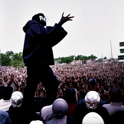 Prompt: mf doom rapping on stage in front of a large crowd, cinematic shot, detailed photography