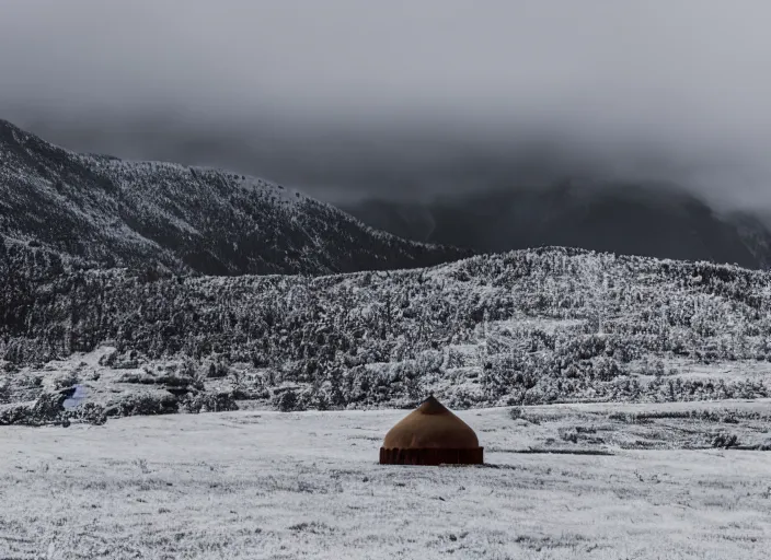 Image similar to a lone yurt on a hill overlooking cloudy mountains in the morning