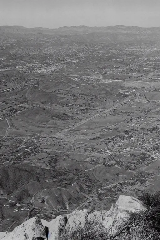 Image similar to retro photograph taken from hill of giant crack!!!!!! in the sky above southern california city