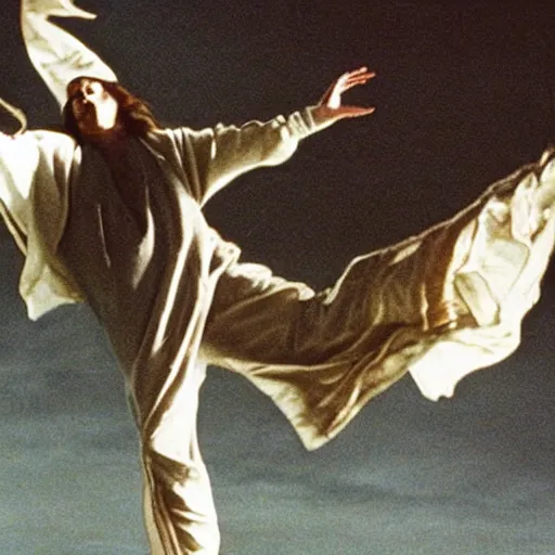 Image similar to a man with long brown hair with a light blue cloak, medieval clothes, kicking in the air, 1 9 9 1, movie still