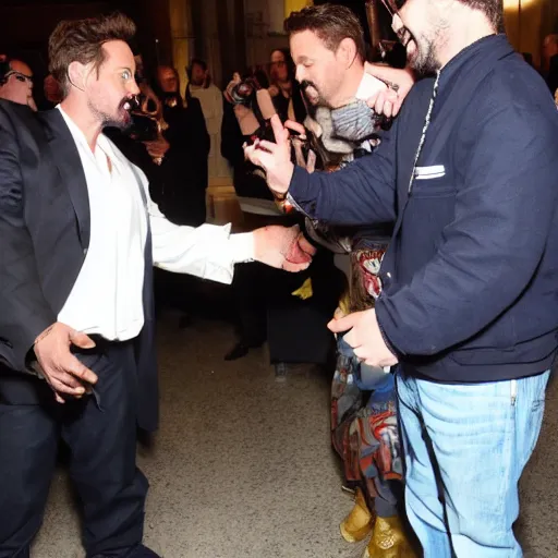 Image similar to ghostface killah dapping up robert downey jr. photo by bill cunningham