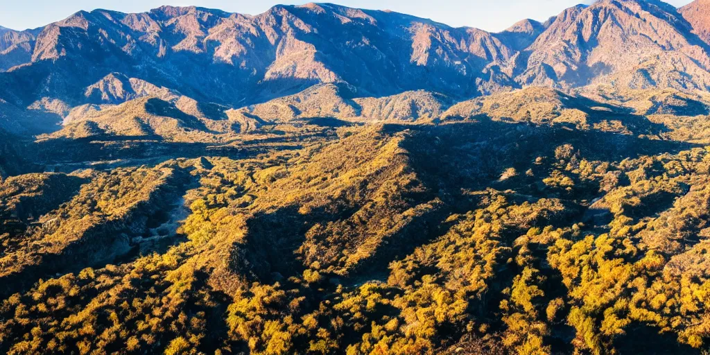 Image similar to drone shot photo of a landscape with mountains and acanyon, wallpaper, very very wide shot, national geographic, award landscape photography, professional landscape photography, sunny, day time, beautiful