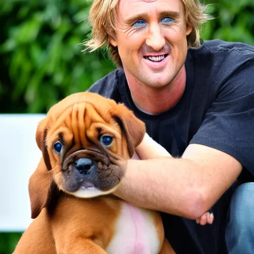 Image similar to 50mm photo, Owen Wilson saying wow holding a boxer puppy