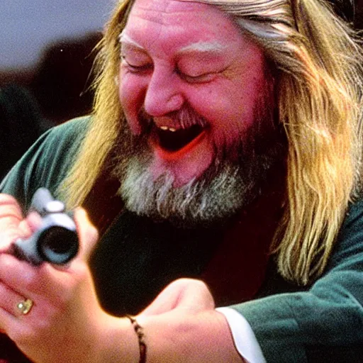 Image similar to robert wyatt laughing maniacally and shooting the viewer with his pistol